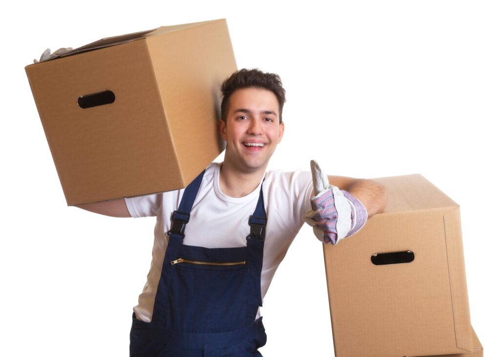 Engagierter Mitarbeiter beim Tragen von Räumungsgut in Schwelm.